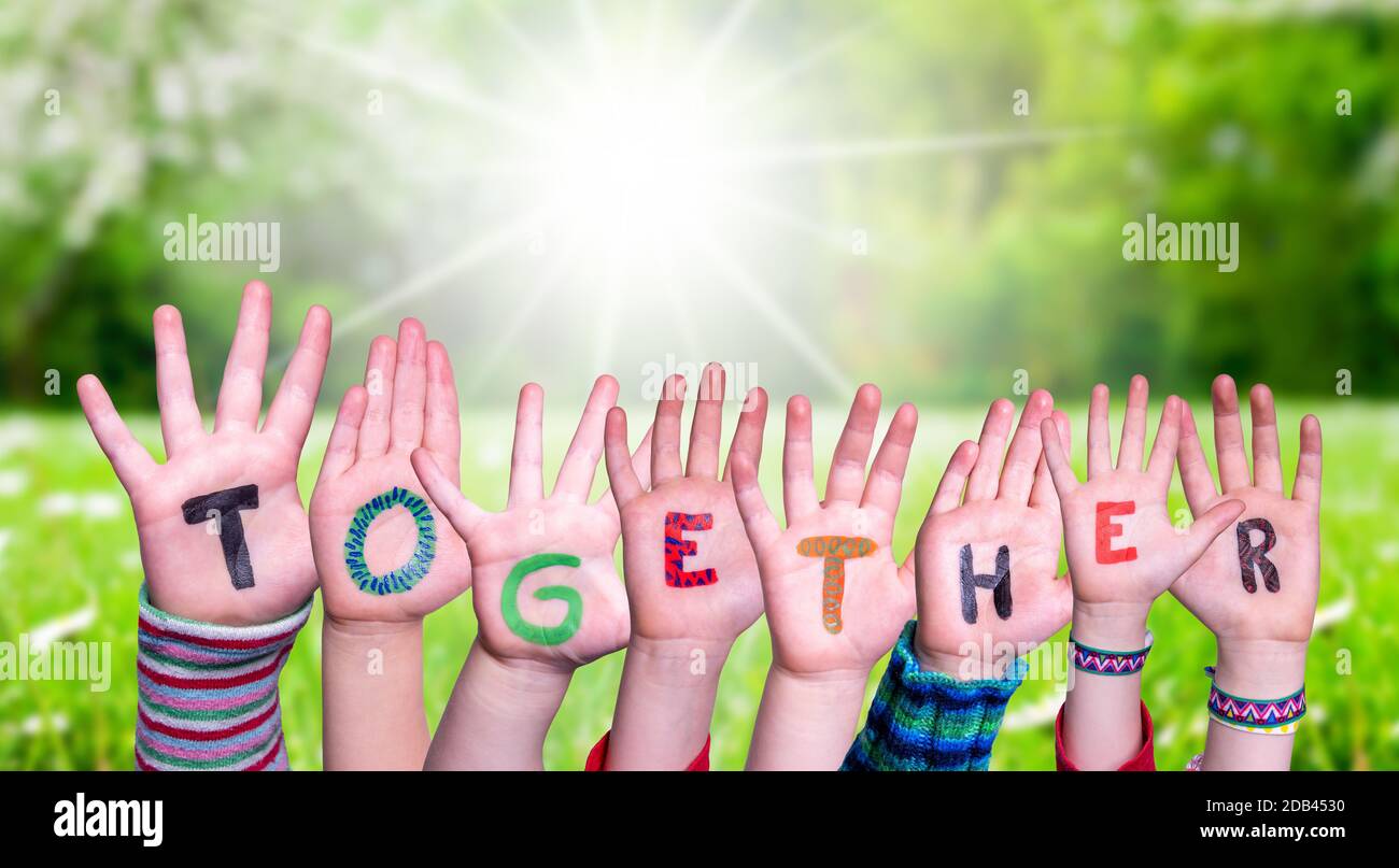 Together With Children Hands Building Colorful Word Together. Green Grass Meadow As ...