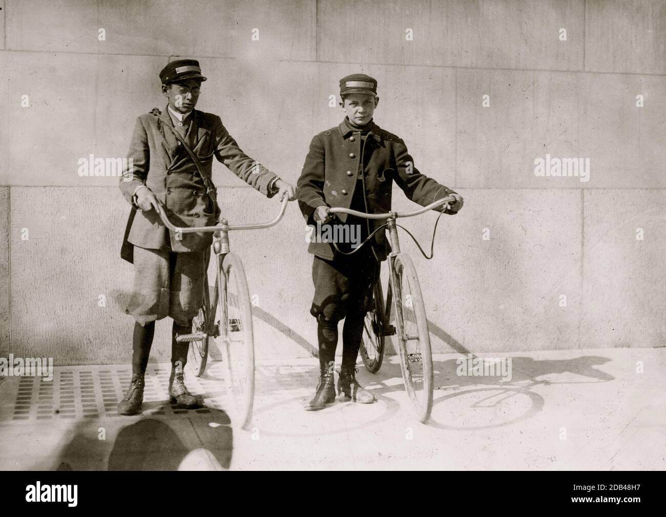 Earle Griffith and Eddie Tahoory, working for the Dime Messenger Service. They said they never knew when they were going to get home at night. Usually work one or more nights a week, and have worked until after midnight. They said last Christmas their office had a 9 yr. old boy running errands for them, and that he made a great deal of money from tips. They make about $7 a week and more, sometimes. Said 'The office is not allowed to send us into the red light district but we go when a call sends us. Not very often.'. Stock Photo