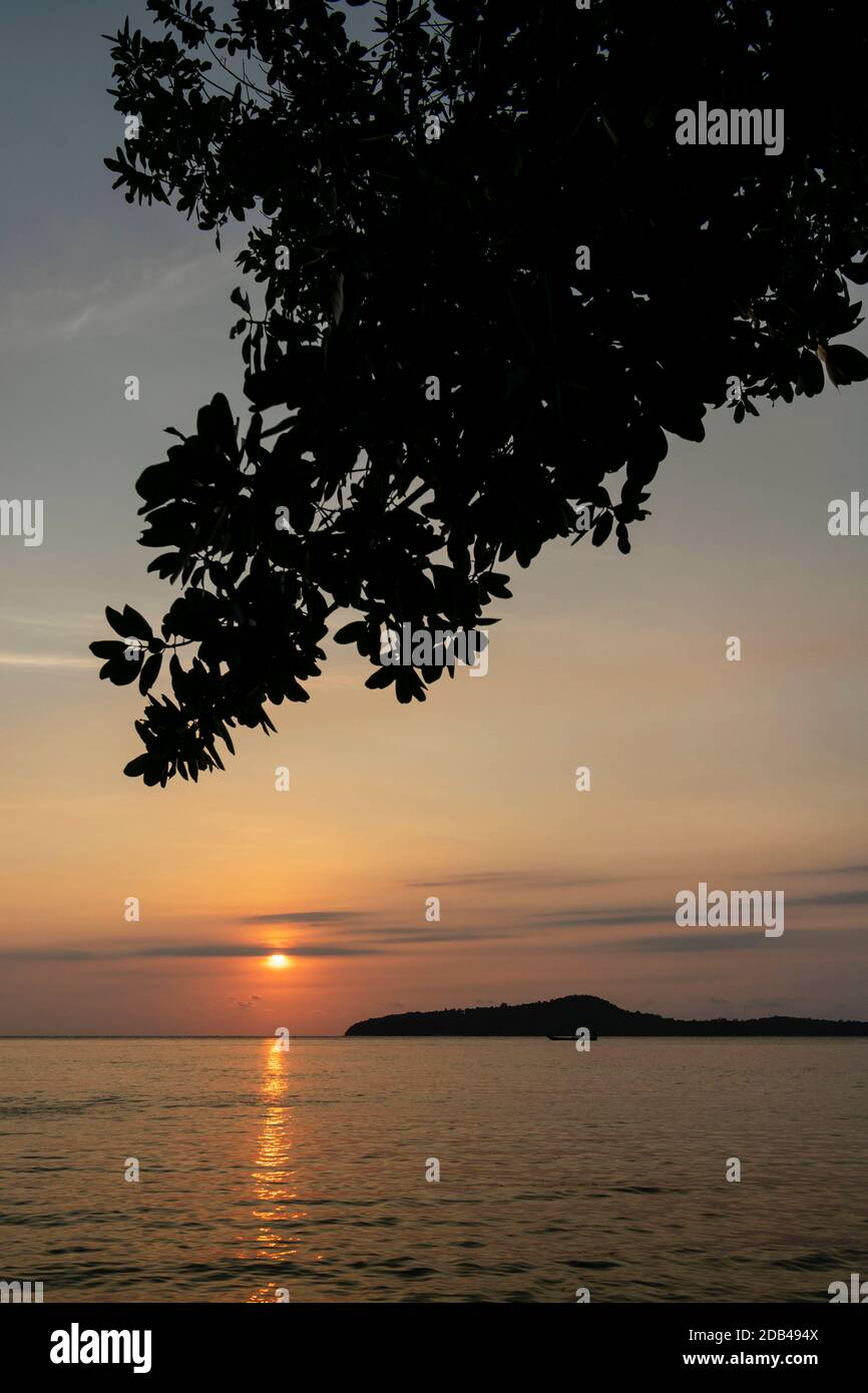 view from Koh Ta Kiev island  towards Koh Russei near Sihanoukville in Cambodia at sunset Stock Photo