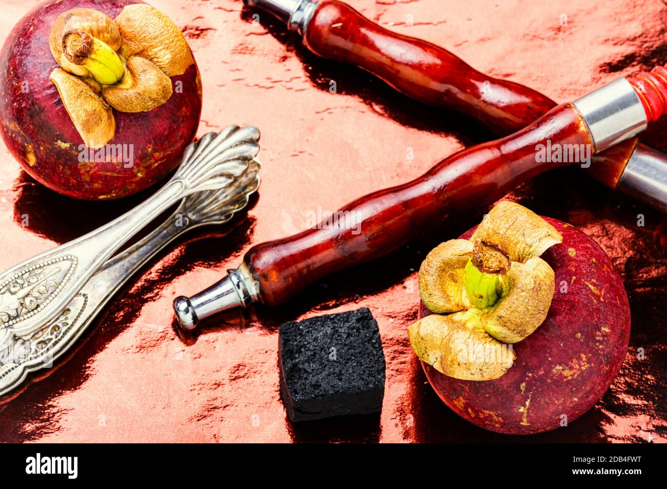 Making hookah with fruit tobacco.Hookah with the aroma of tropical mangosteen fruit Stock Photo