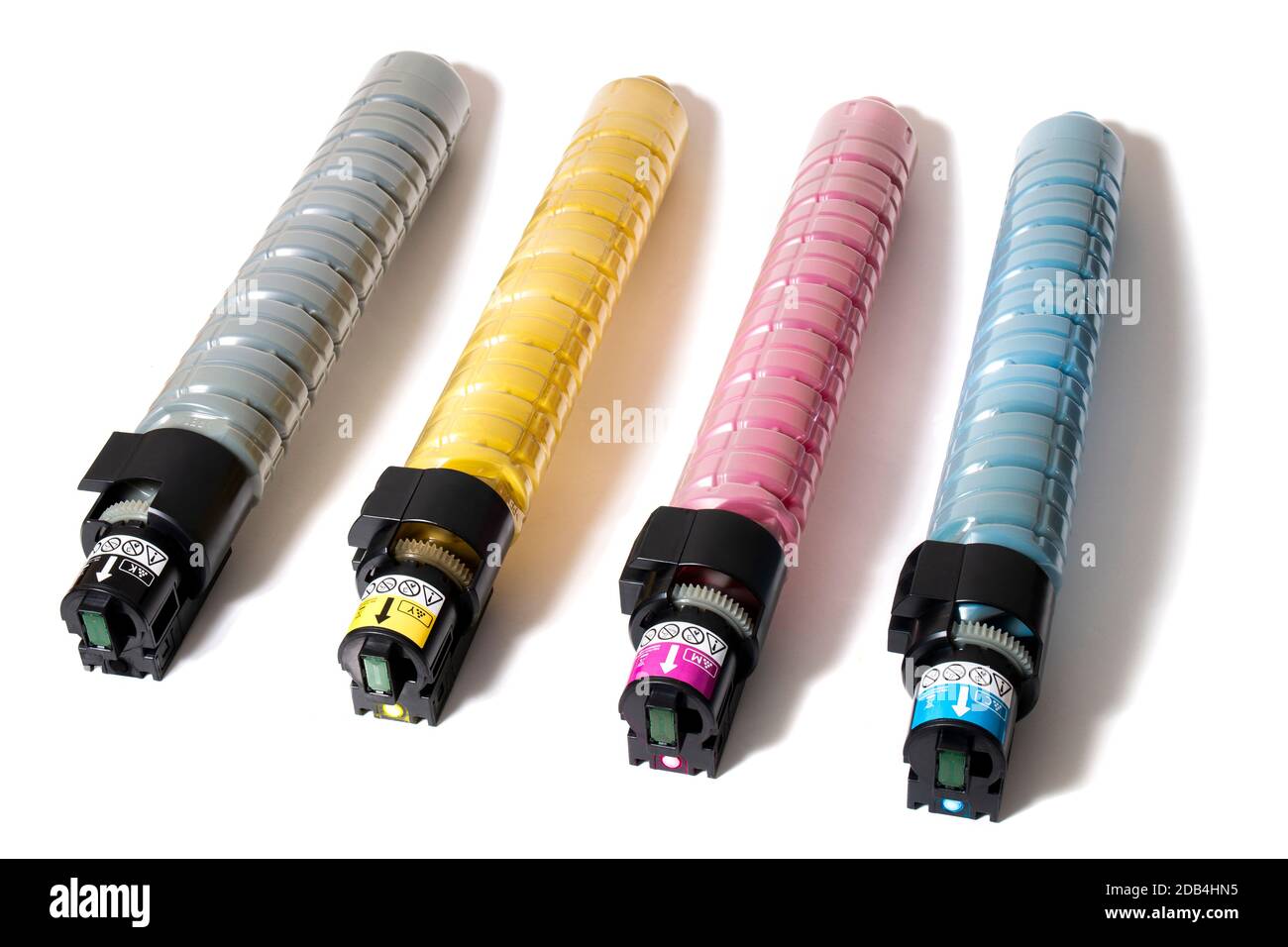 cartridges for laser printers aligned on a white background. Stock Photo