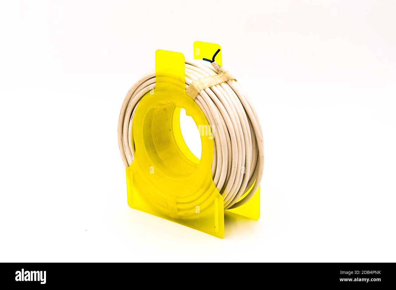 Small cable reel drum isolated on an isolated white background Stock Photo