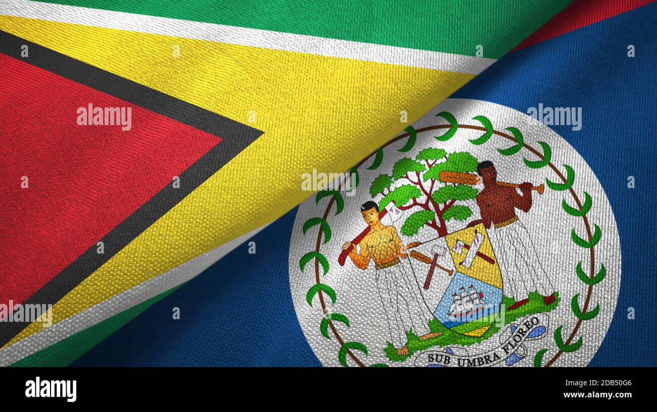 Guyana and Belize two flags textile cloth, fabric texture Stock Photo ...