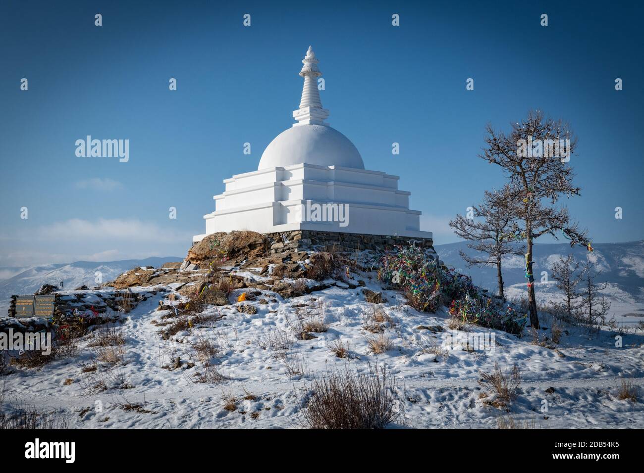 Ogoy Island, Baikal Lake, Russia- White Buddhist stupa and the baikal lake Stock Photo