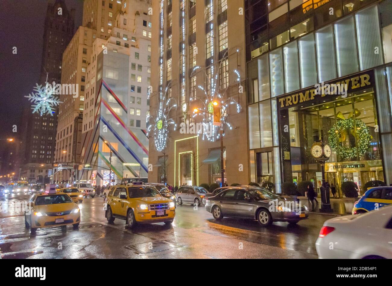 Busy Avenue Outside Trump Tower in Manhattan. Street Dressed in Christmas Mood with Bright Light Decoration. New York City, USA Stock Photo
