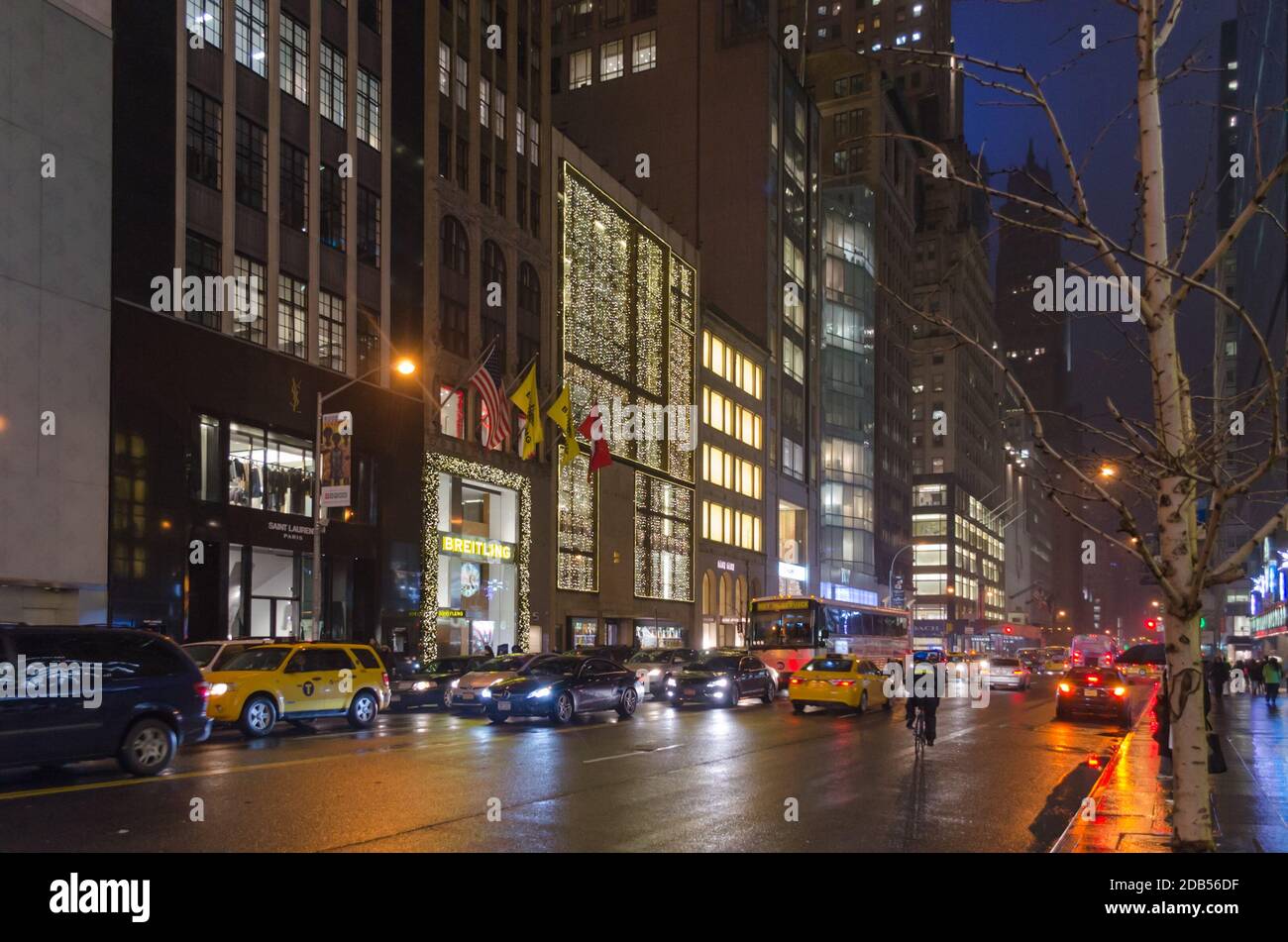 Busy Avenue in Manhattan. Street and Stores Dressed in Christmas Mood with Bright Light Decoration. Stock Photo