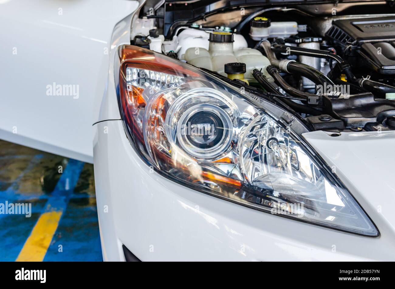 Car detailing After polishing the car headlights Stock Photo Alamy