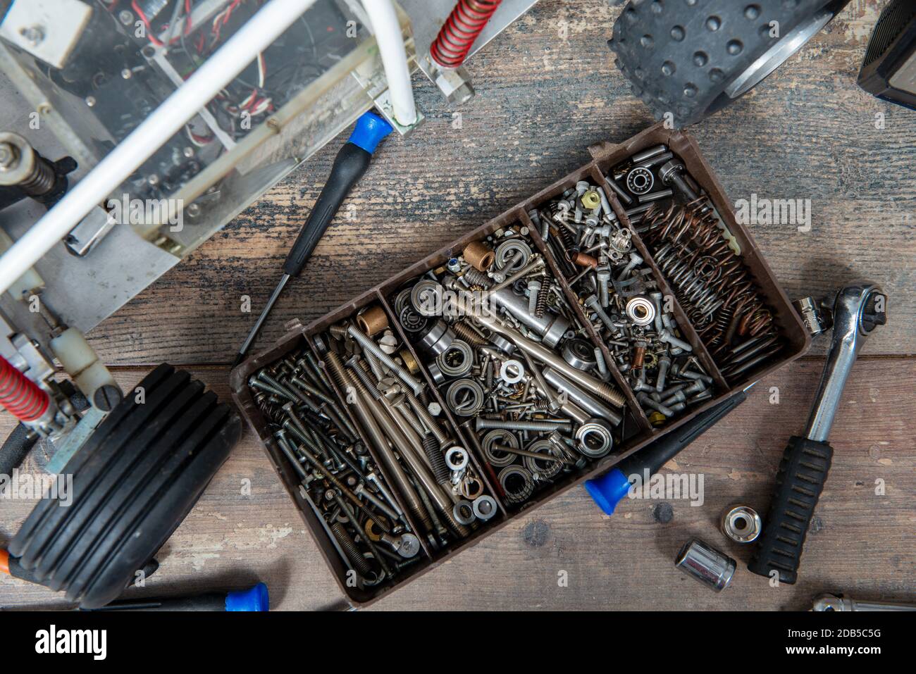 a Radio-controlled car model with tools for repairing RC buggy models ...