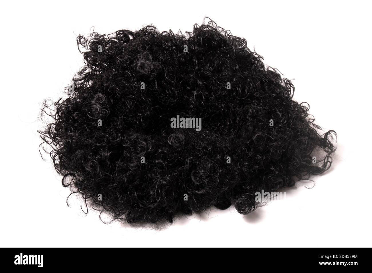 curly afro wig isolated on a white background. Stock Photo