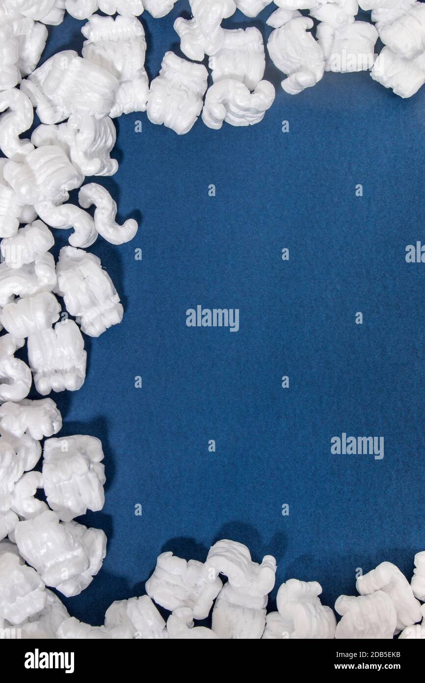 Polystyrene or white styrofoam packing pieces used for minimize bumps ...