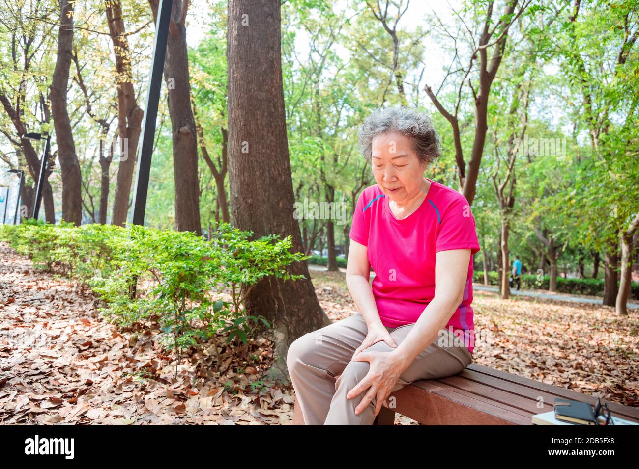 senior woman suffering from pain in leg and knee Stock Photo - Alamy