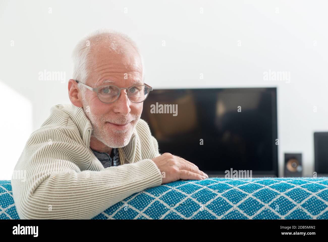 Senior man with grey hairs wearing eyeglasses Stock Photo