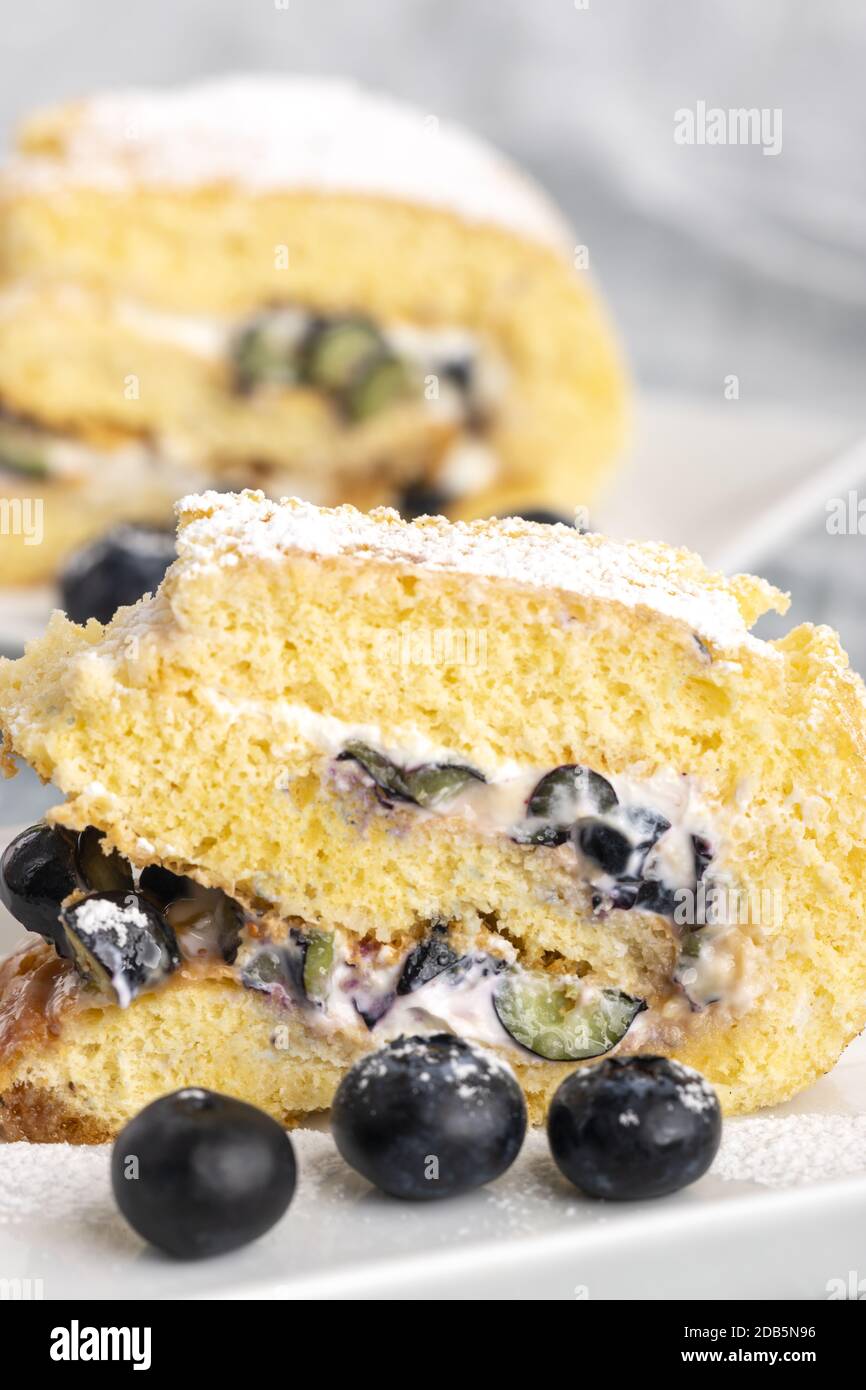 sponge roulade cake with blueberry Stock Photo - Alamy