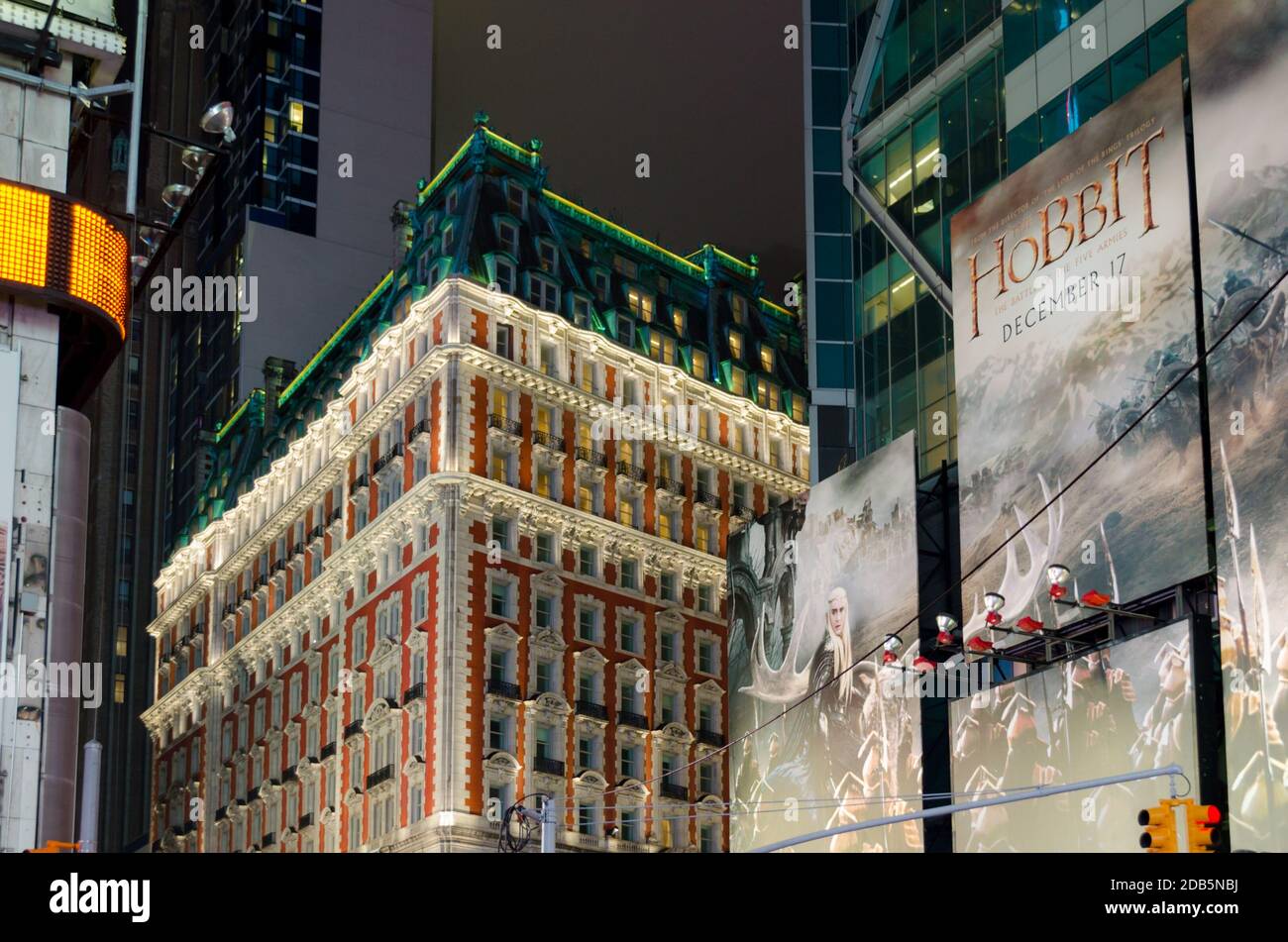 Christmas in New York's Times Square with Hobbit Advertisement and Impressive Illuminated Buildings. Stock Photo