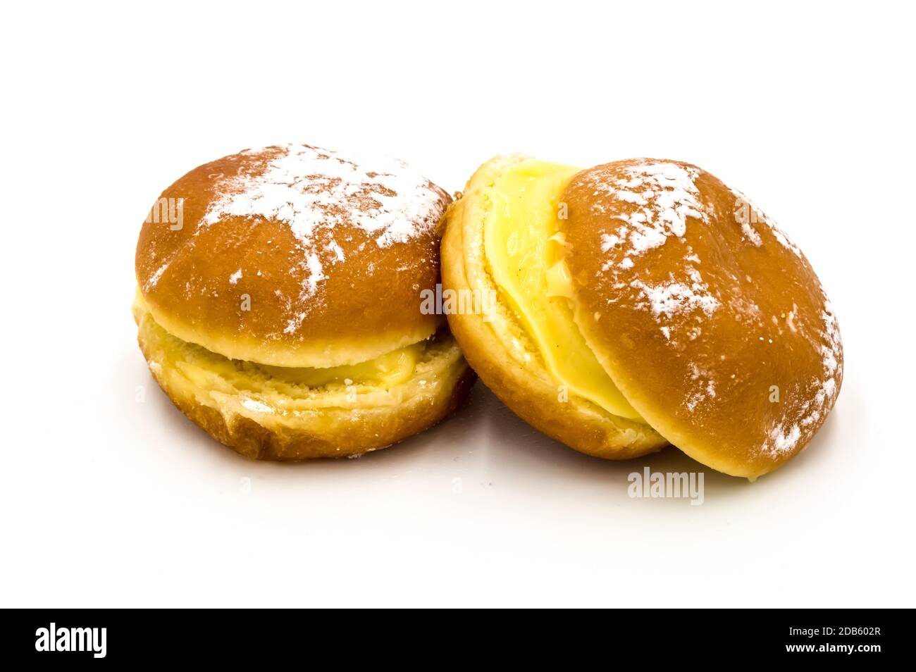 Bola de Berlim, or Berlim Ball, a Portuguese pastry made from a fried donut  filled with sweet eggy cream and rolled in crunchy sugar on a white backgr  Stock Photo - Alamy