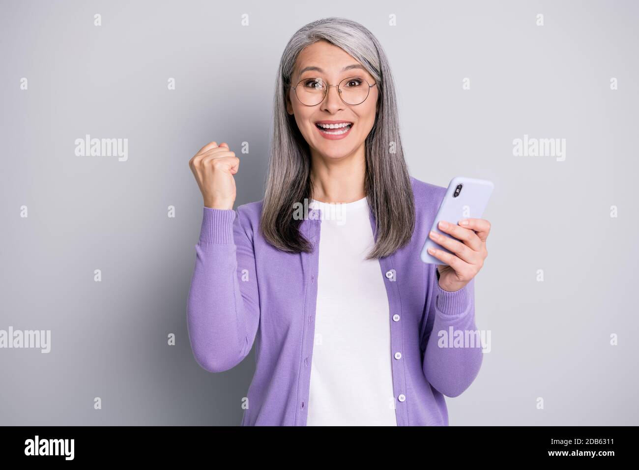 Mature woman fist up isolated hi-res stock photography and images - Alamy