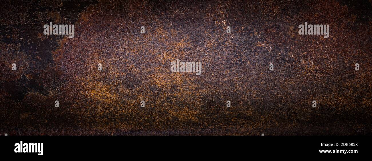 Rough rusty metal texture. Dark background image Stock Photo