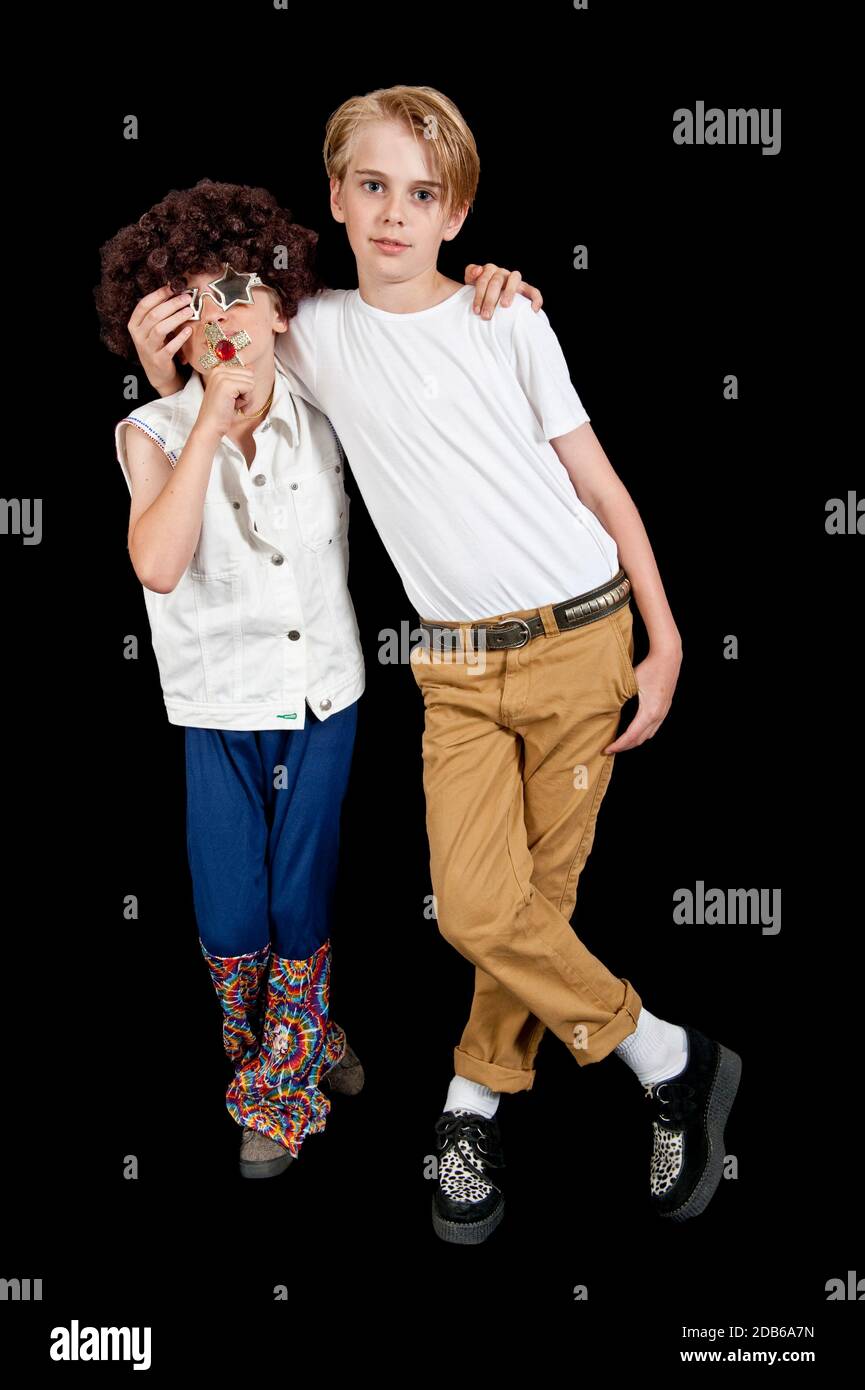 Two boys with arms around each other hi-res stock photography and ...