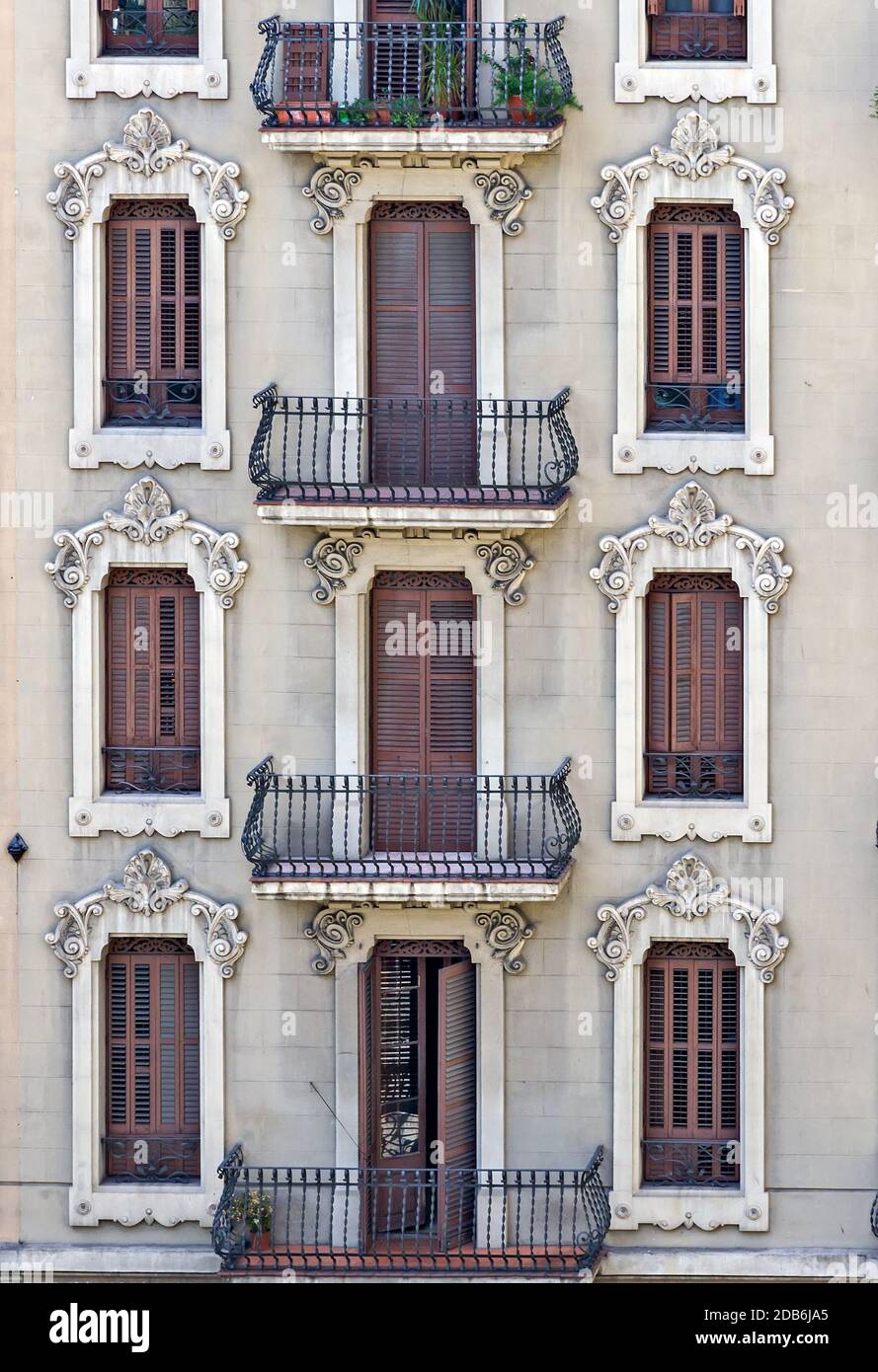 Facade of a building with balcony and windows in old house Stock Photo ...