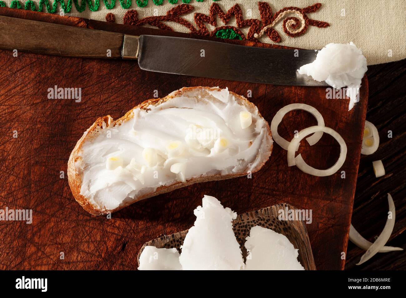 Sandwich made of crispy bread, homemade lard and onion. Traditional delicacy made of pig fat