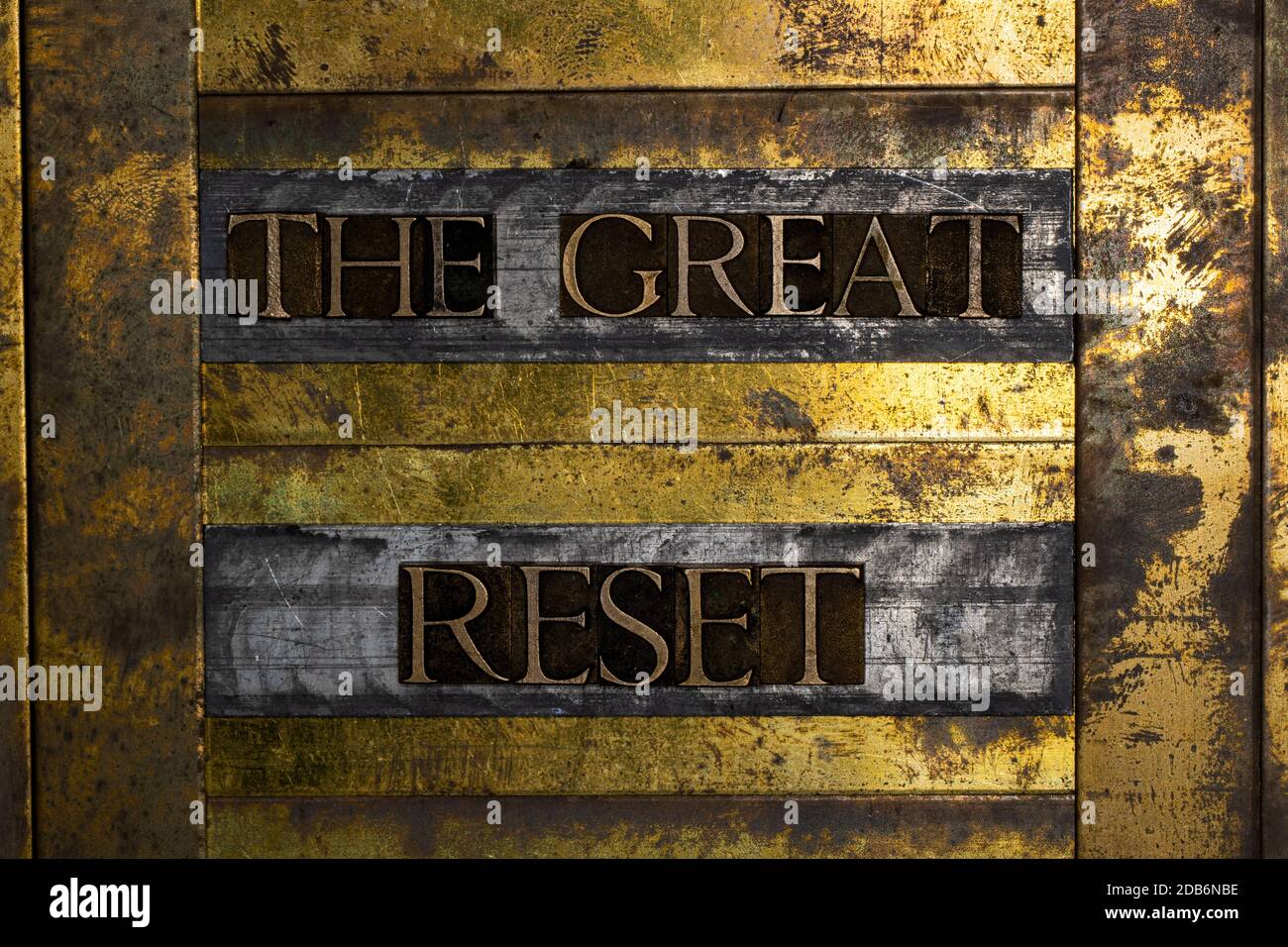 The Great Reset text message on textured grunge copper and vintage gold background Stock Photo