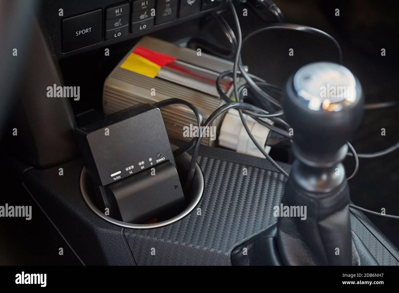 Charging camera batteries on a road trip in the car using AC inverter