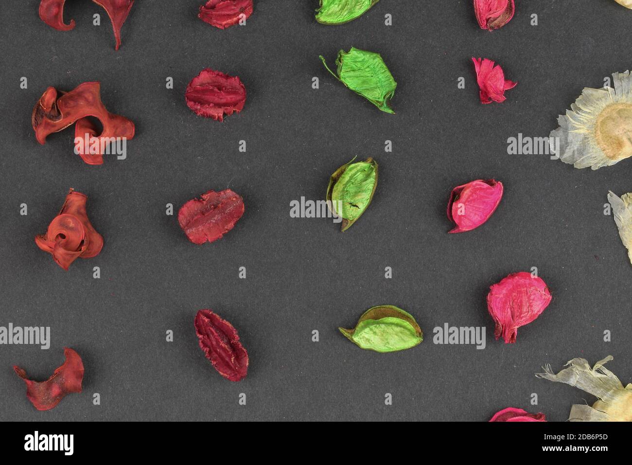 Potpourri on a black background. Flavored potpourri leaves. Dry