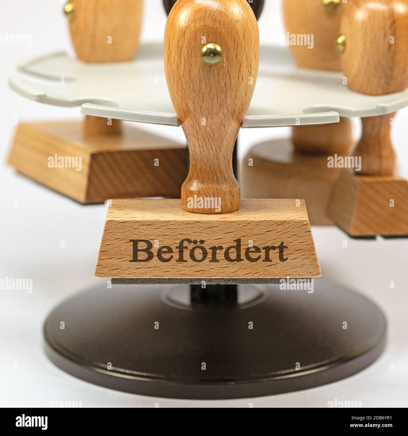 Rubber stamp that reads 'Beförderung', translation 'Promoted' Stock Photo