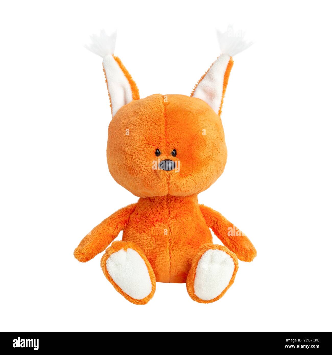 Cute plush orange squirrel isolated on white background. Soft toy for children. Toy forest animal. Stock Photo