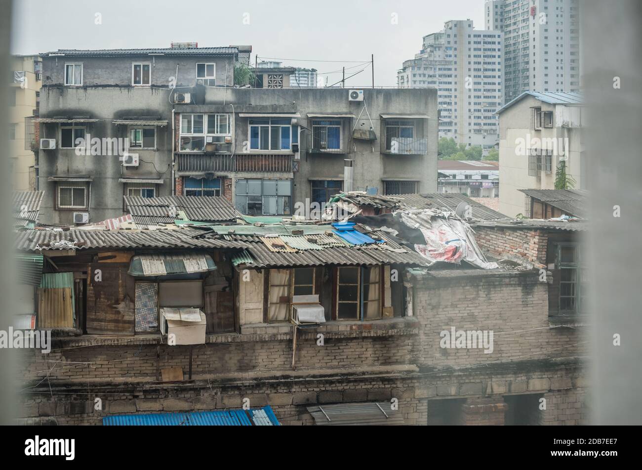 Yichang, China - August 2019 : View of the tin roof of homes in Yichang poor suburb, Hubei Province Stock Photo