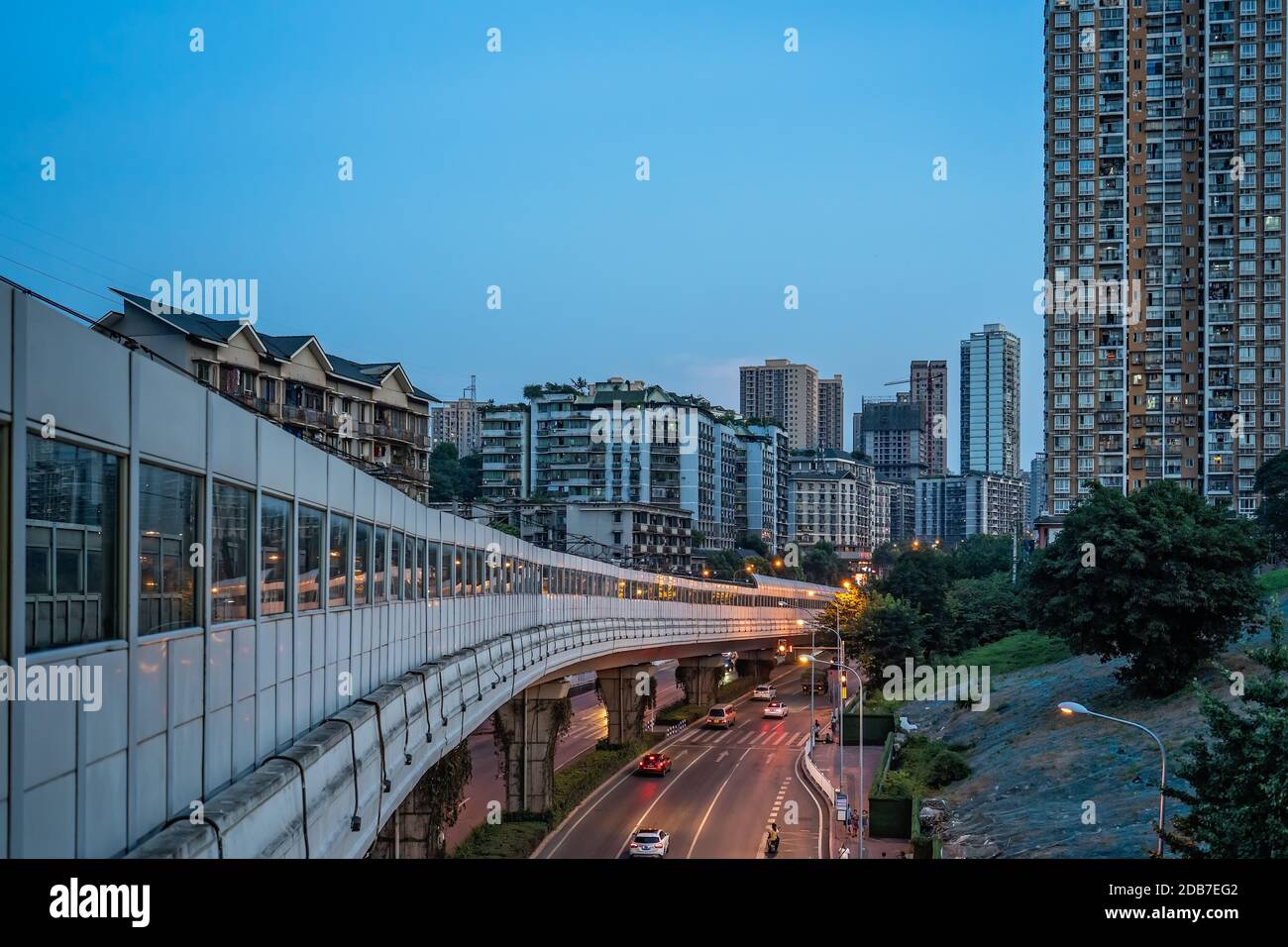 Chongqing, China -  August 2019 : View of the train overground and underground on the outskirts of Chongqing city Stock Photo
