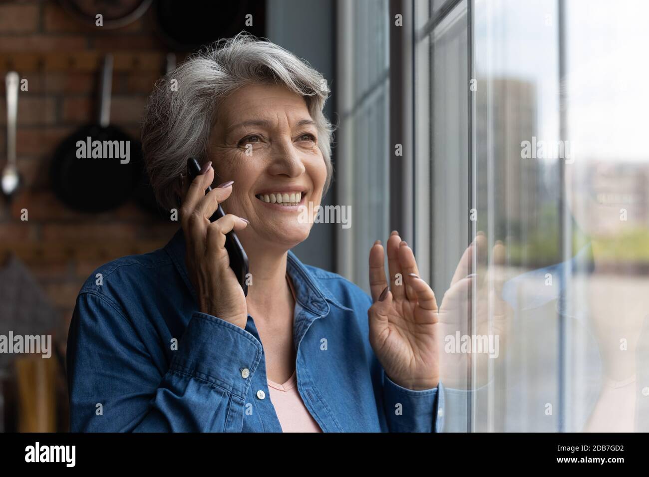 Happy mature woman near hi-res stock photography and images - Alamy