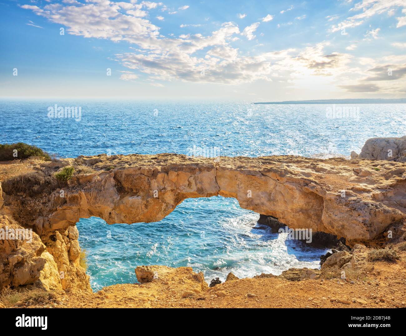 Famous Lovers Bridge or Raven Arch on Cape Cavo Greco. The main ...