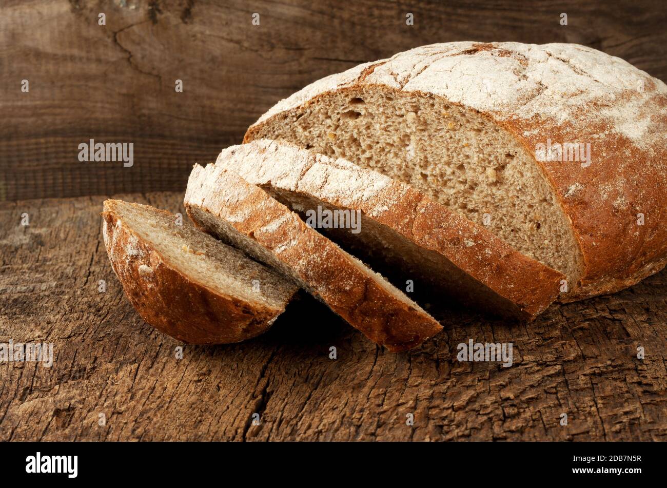 Sliced rye bread on a wooden table Stock Photo