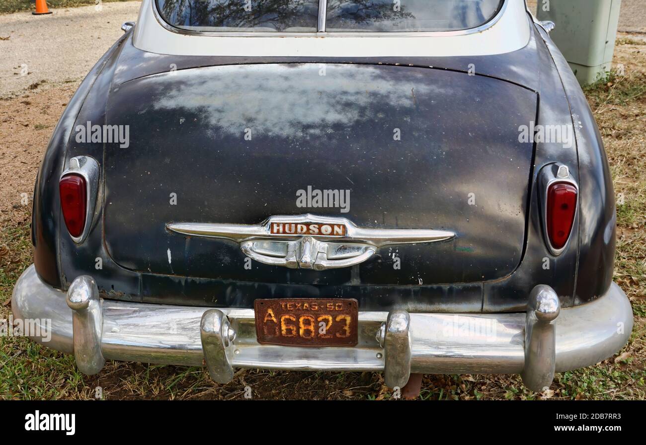 Frederickburg,Texas - Nov.11,2020   The rear end of a 1950 Hudson Super 6 with a 1950 Texas license plate. Stock Photo