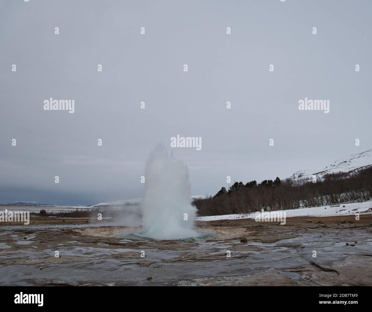 The water fountain of the famous Strokkur Geyser in Iceland Stock Photo ...