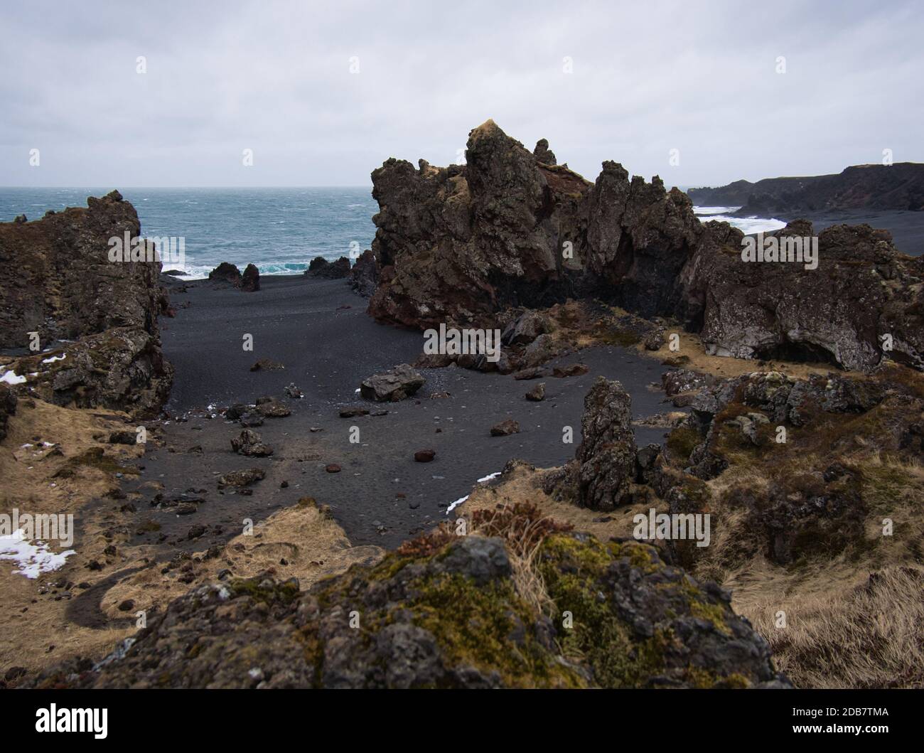 Beach with lava rocks and vegetation hi-res stock photography and ...