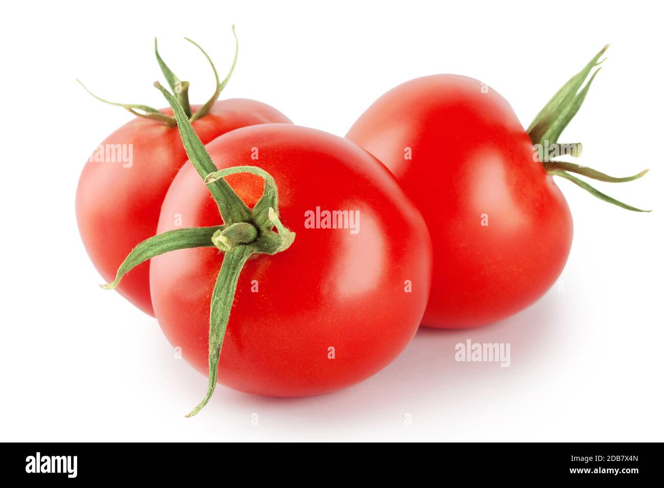 Three ripe red tomatoes isolated on white background Stock Photo - Alamy