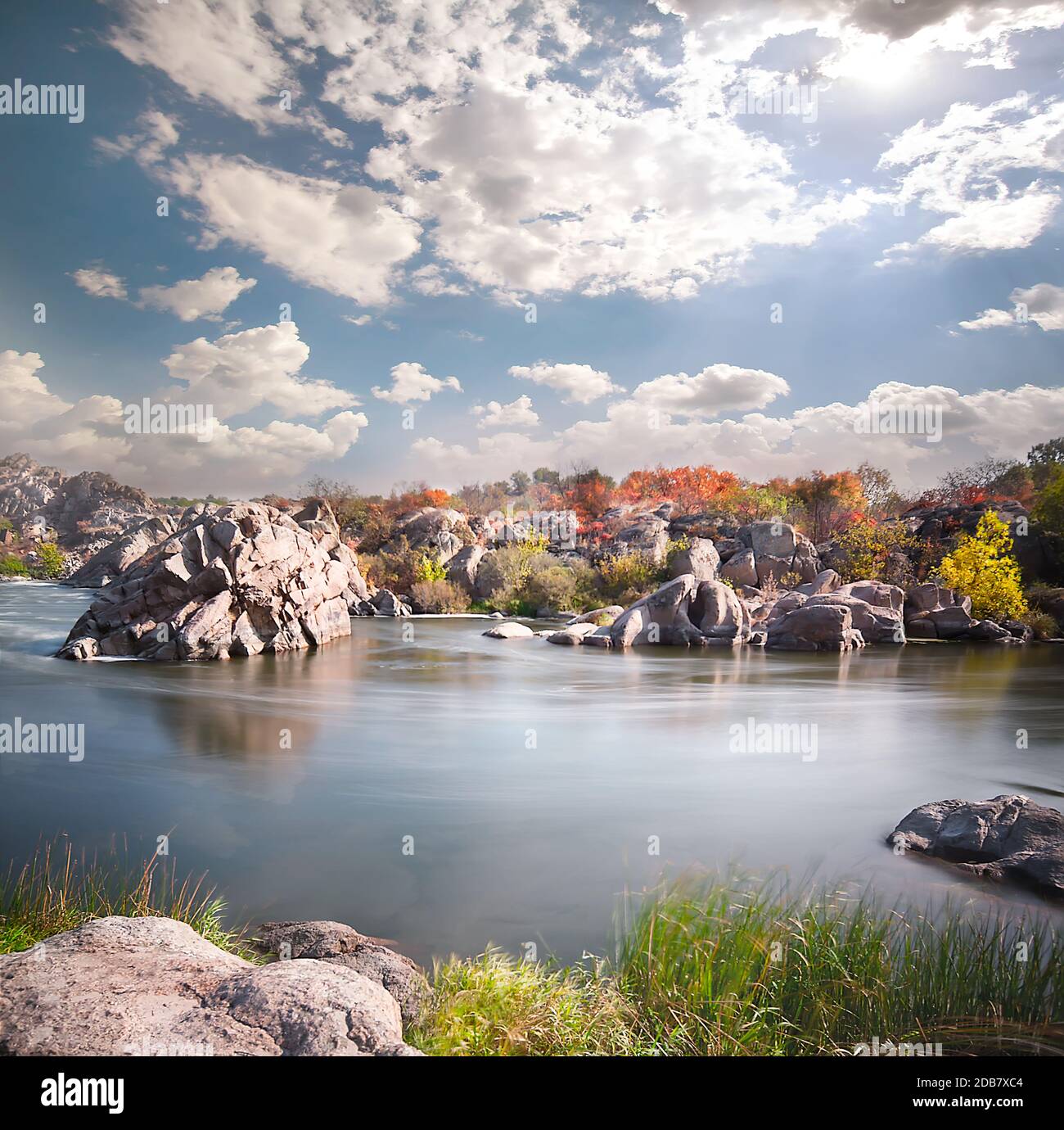 With Rivers Raring Below Forest reflection among river rocks hi-res stock photography and images ...