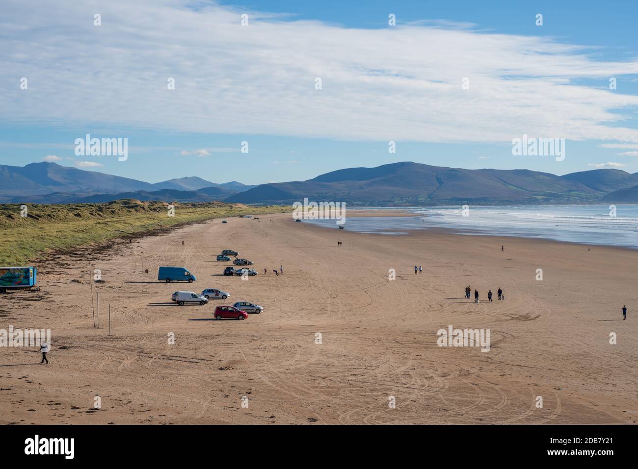 Parking on the spectacular 3 mile long Inch beach, near Dingle on the Wild Atlantic Way, a beautful scenic area on the West coast of Ireland. Stock Photo
