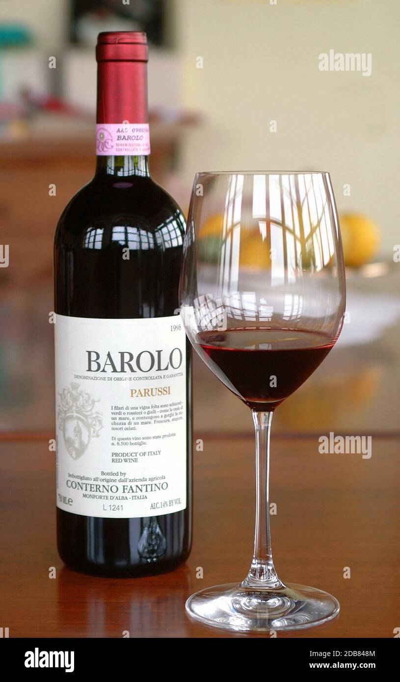 Turin, Piedmont/Italy. -10/24/2009- The Wineshow. Bottle of aged red ...
