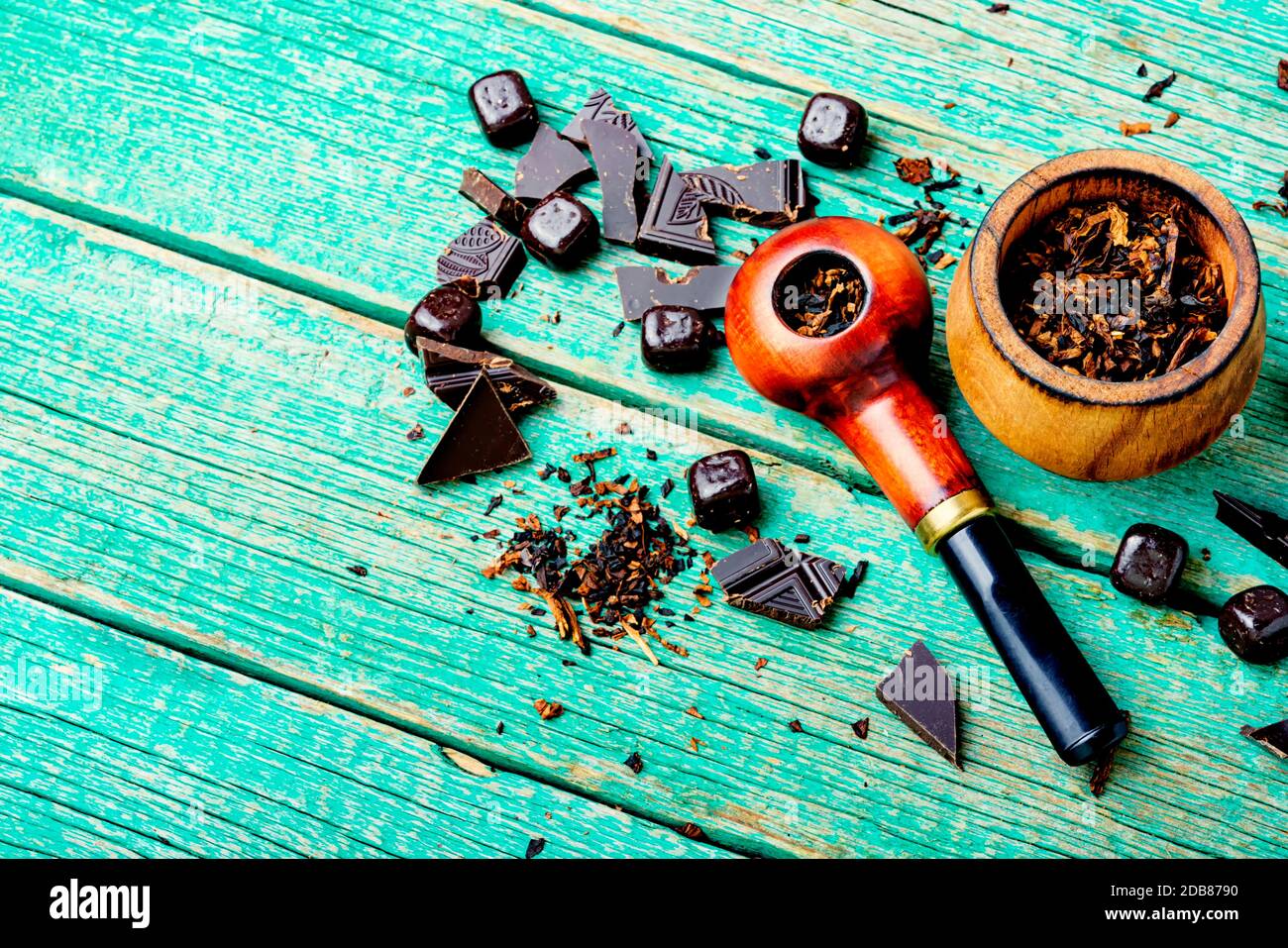 Chocolate flavored tobacco for smoking pipes.Tobacco pipe filled with
