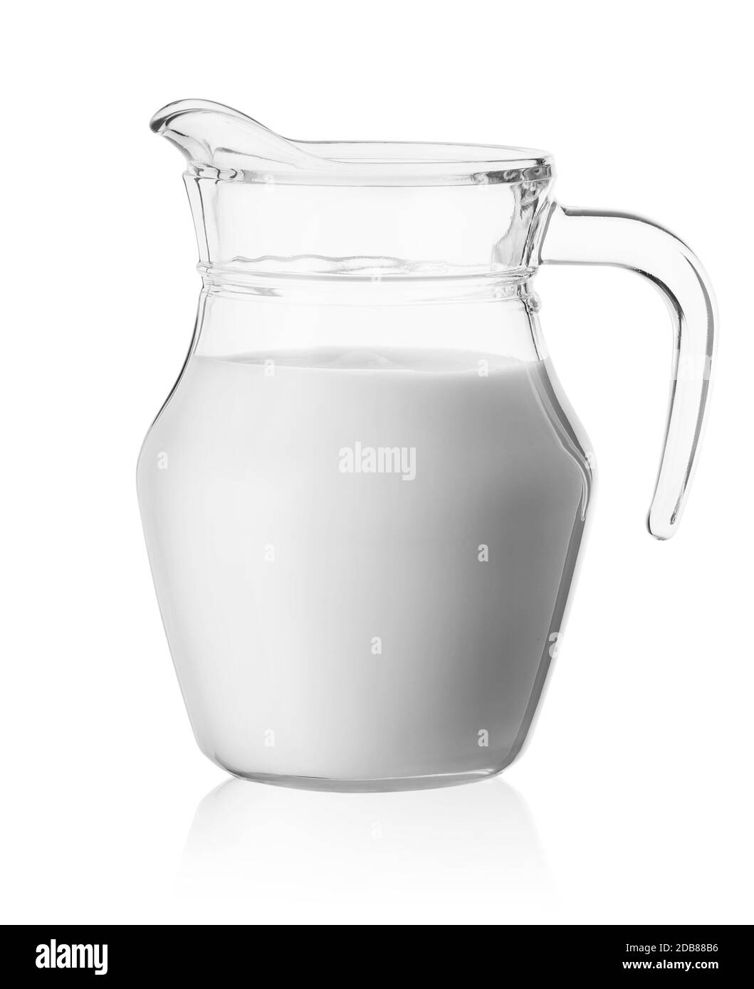 Milk in a glass jug isolated on a white background Stock Photo Alamy