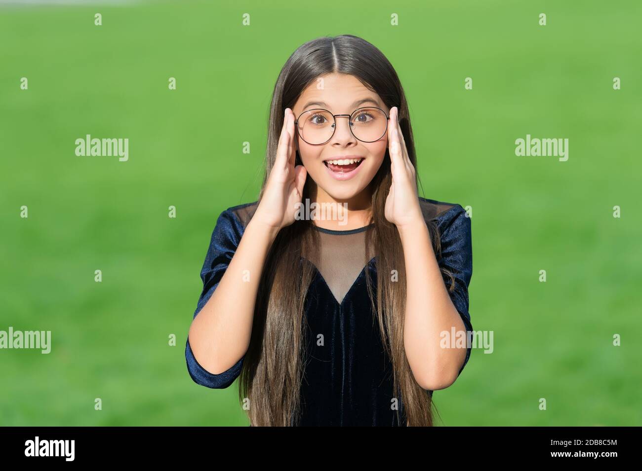 Look sharp and stay focused with best glasses. Happy child wear glasses  green grass. Fashion eyewear. Eye protection. Vision correction. Optician  salon. Pediatric ophthalmology Stock Photo - Alamy