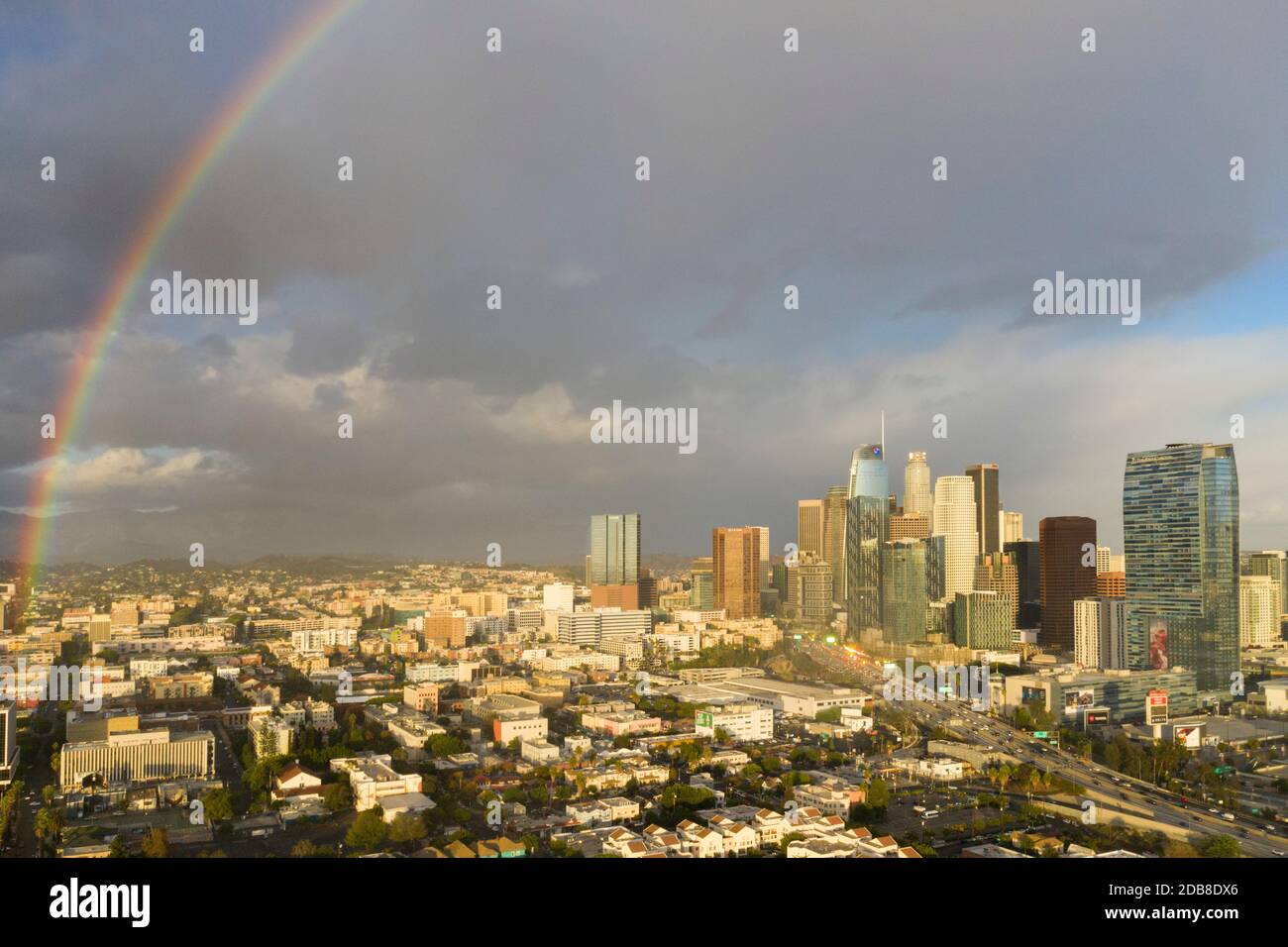 Rainbow over downtown Los Angeles and Westlake neighborhood after a storm Stock Photo