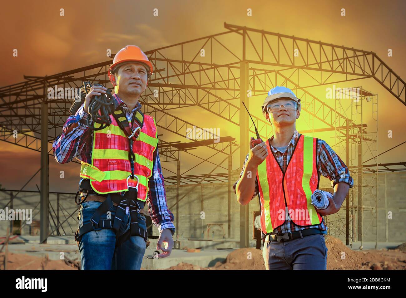 Two engineers on a construction site, Thailand Stock Photo