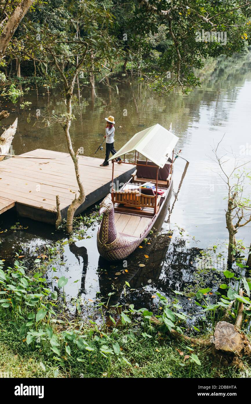 Boat rider on a Cambodian river Stock Photo Alamy