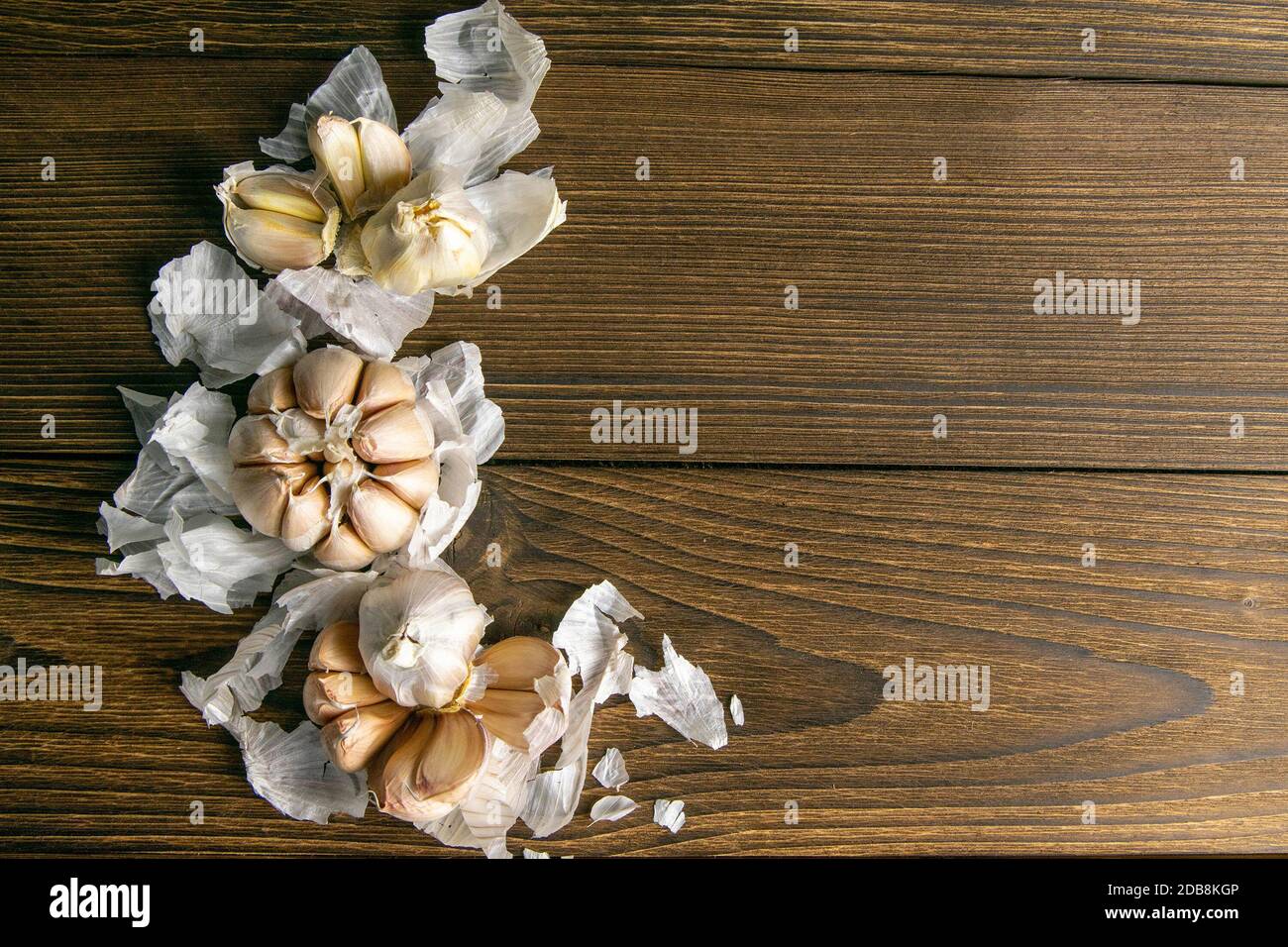 Garlic on vintage wood texture background. Top views with clear space ...