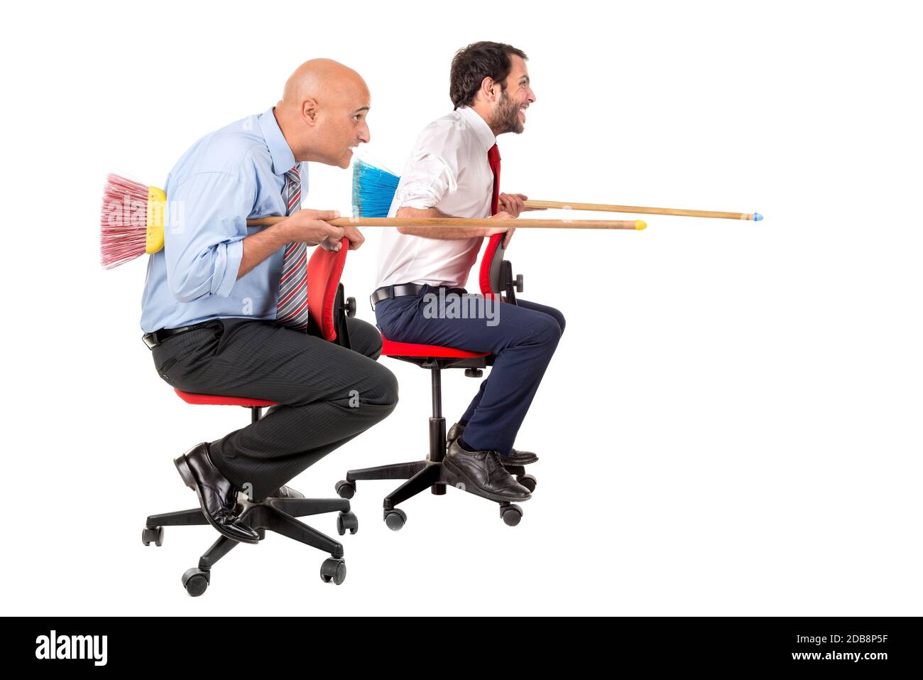 workers in chairs charging with brooms, isolated in white Stock Photo