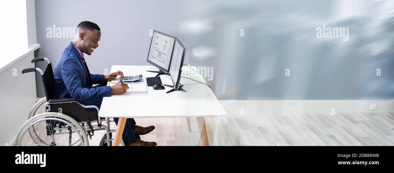 Disabled African Accountant Working On Computer In Wheelchair Stock ...